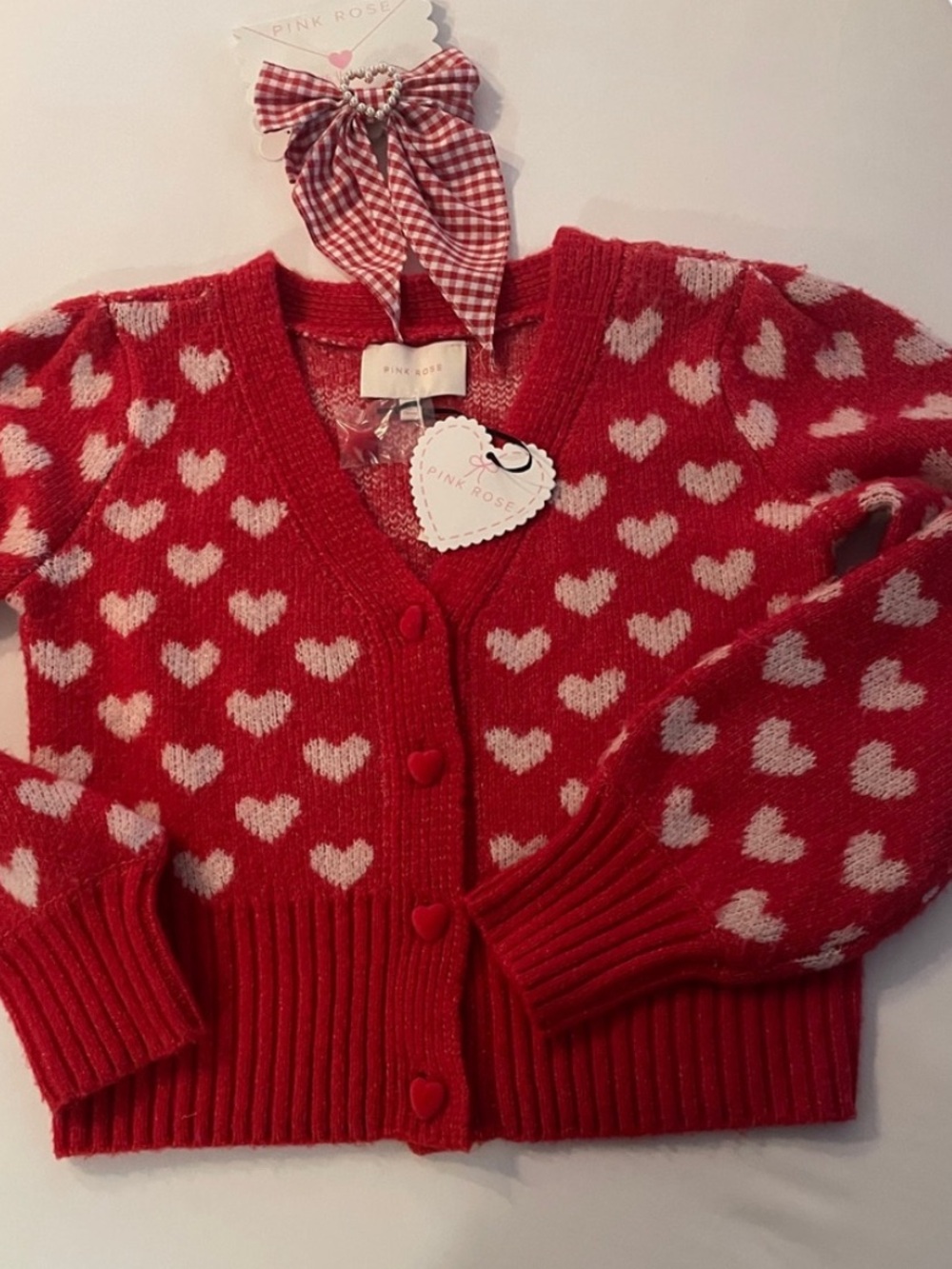NWT Pink Rose Red and White Heart Pattern V-Neck Cardigan 2/ bow in size medium